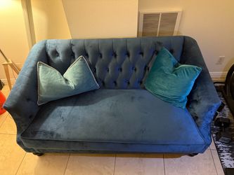 Blue velvet couch and chair