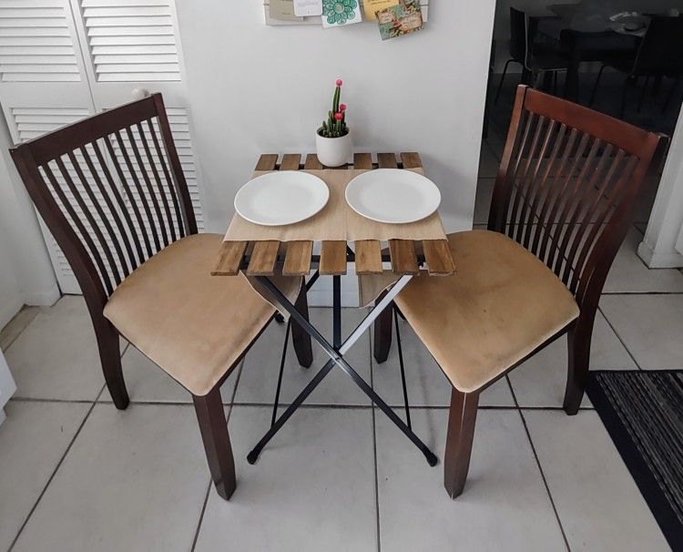 Two Wood With Suede Chairs And Small Table