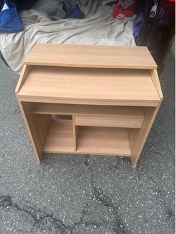 An almost new IKEA desk, with pulling the second part, a draw, and storage