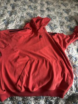 Orange Adidas sweatshirt