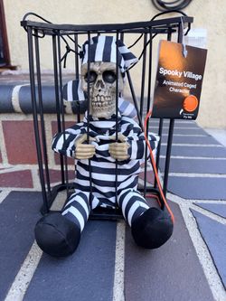 Spooky Village Animated Caged Skeleton Character