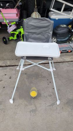 Baby highchair for camping etc. Folds up for easy storage