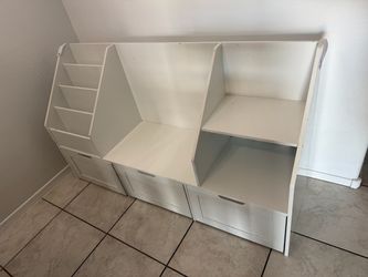 Kids bookshelf with toy storage.