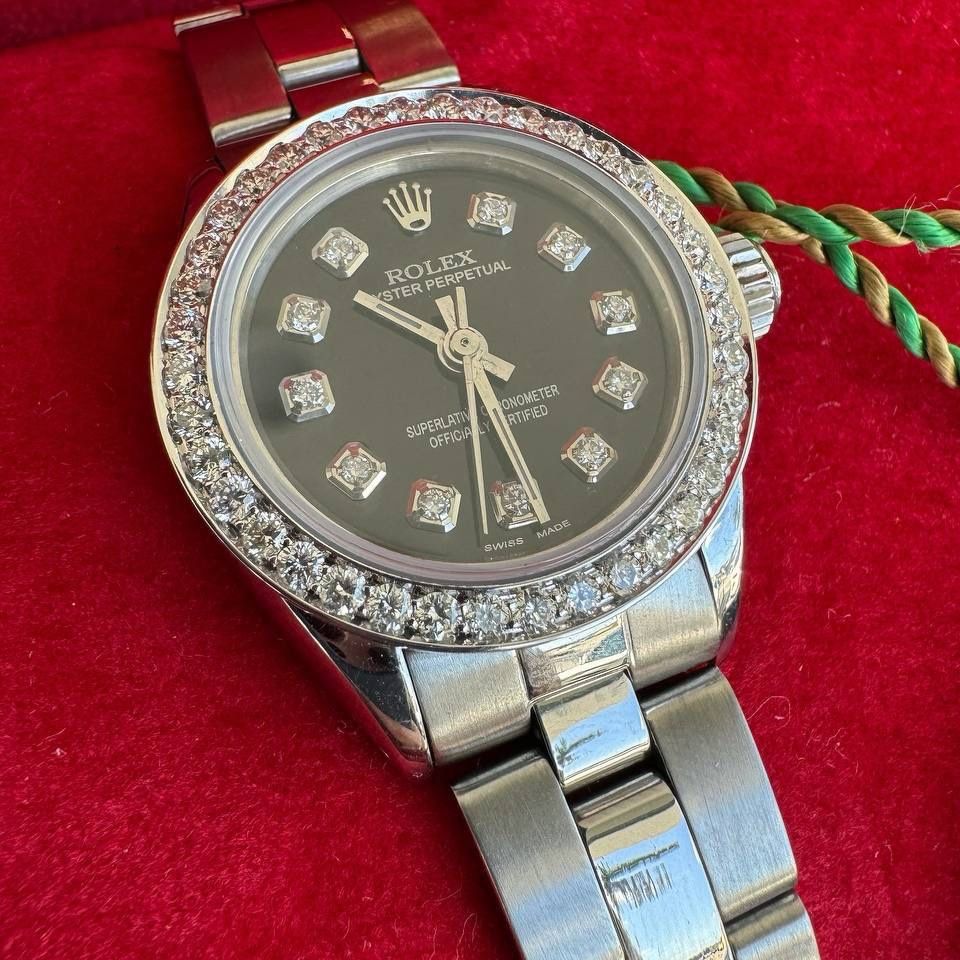 Rolex Oyster Perpetual no date 24mm black diamond dial white gold diamond bezel box and papers lady watch