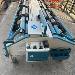 Carpet Cutting And Rolling Machine