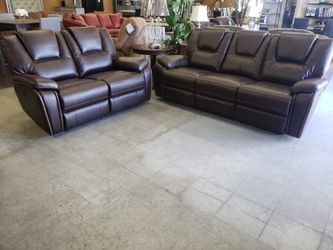 Brown leather power reclining sofa and loveseat
