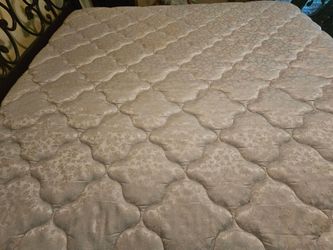 Full Sized bed mattress and box spring very clean headboard and footboard included