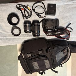 Canon DSLR Camera, Lenses, Charger, Bag, And Lens Hoods