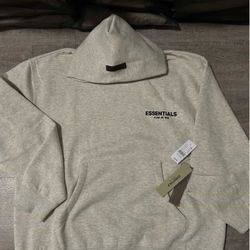 Size small light oat essentials sweater 