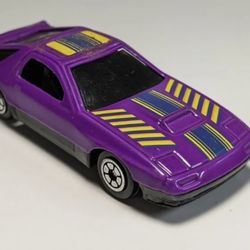 Here's a Vintage Yatming #807 Purple 2nd Gen Mazda 