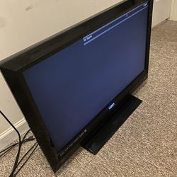 Two Different TVs A 32in Vizio And A 37in Element