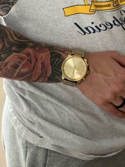 Gold Diesel Watch and Case
