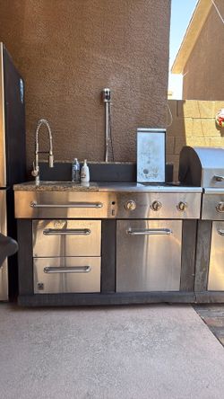 Maser forge outdoor barbecue with a stove sink storage