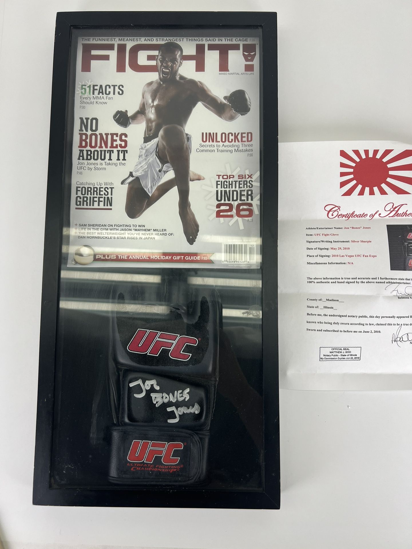 Jon “Bones” Jones Signed UFC Glove In Case With Notarized COA 