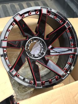 Xtreme mudder XM 22x12 6x135/6x139.7 -44 gloss black red for$300 each