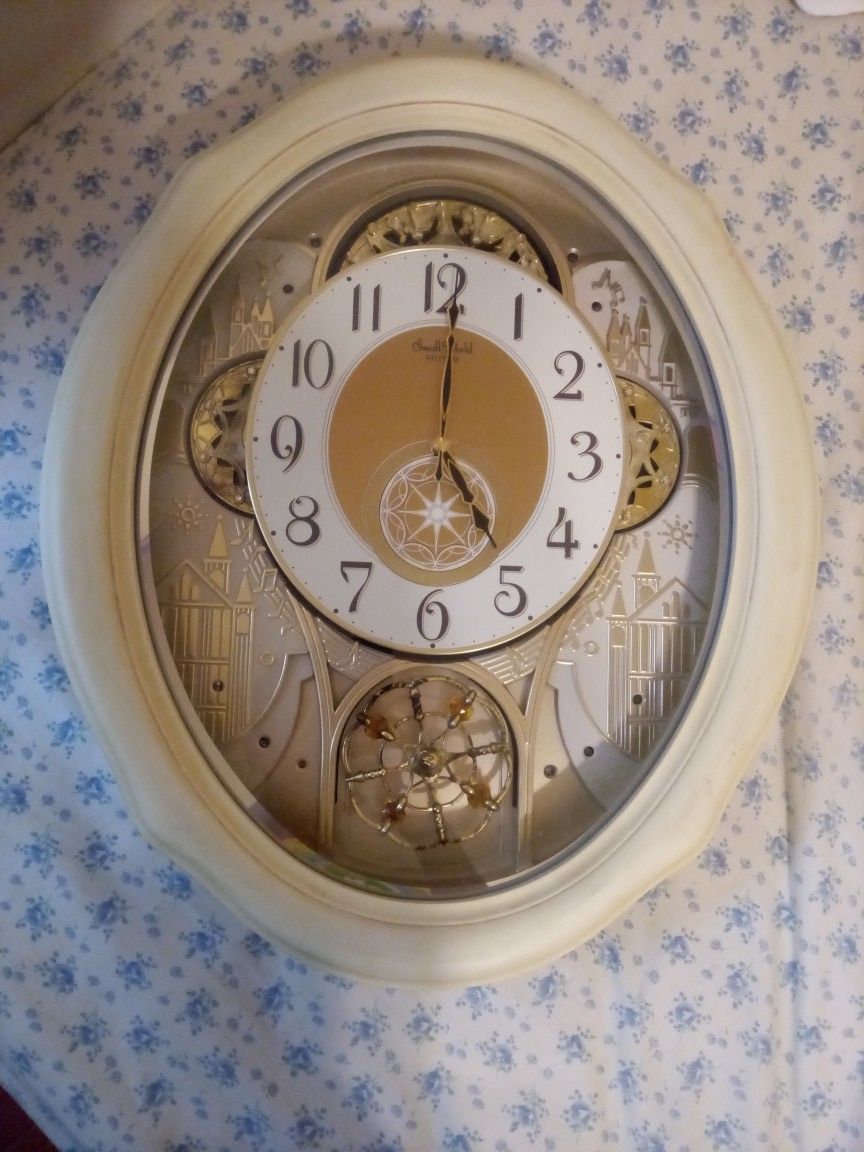 Rhythm Clock Musical Ivory Cottage Small World