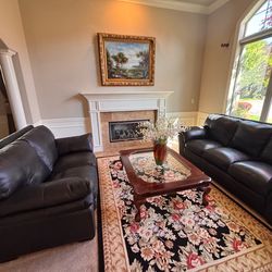 Two leather coach sofa