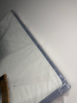 Mattress in Plastic Wrap