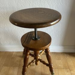 Antique Swivel  Stool With Glass Ball and Claw Feet.