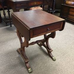 Beautiful Wooden Flip top table, metal claw feet, one drawer