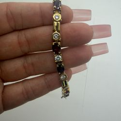 18K BRACELET WITH DIAMONDS AND RUBIES