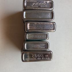 Nice vintage collection lot of Vietnam era cigarette era Zippo zippos and others 