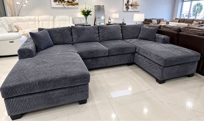 For Sale - Sectional upholstered in gray corduroy - Ask For price