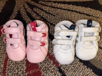 Used 2 pairs of Adidas baby crib shoes size 2K