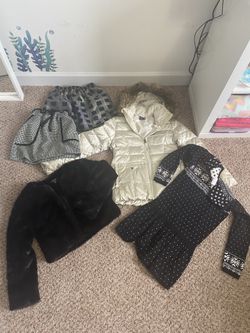 The North Face girls jacket on beige size 10/12 And More Gifts 