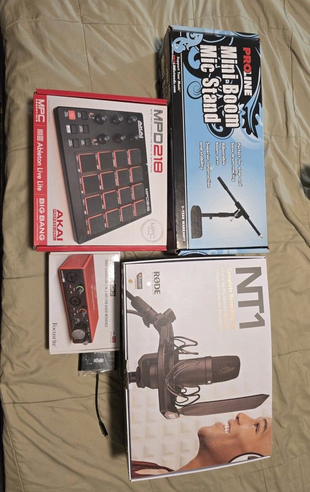Rode NT1 Mic Kit, Scarlett 2i2 3rd Gen Audio Interface, Akai MPD 218, Mic Stand, Tripp-Lite.