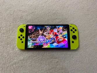 Nintendo Switch OLED + 125 Switch Games