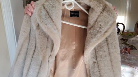 Terry Lewis Faux fur coat.