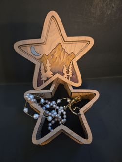 Laser cuts star mountain landscape