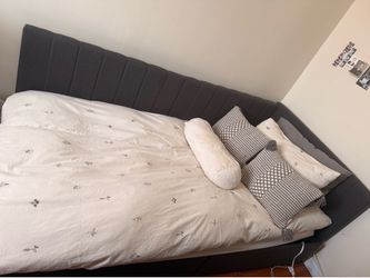 Gray twin bed with two drawers