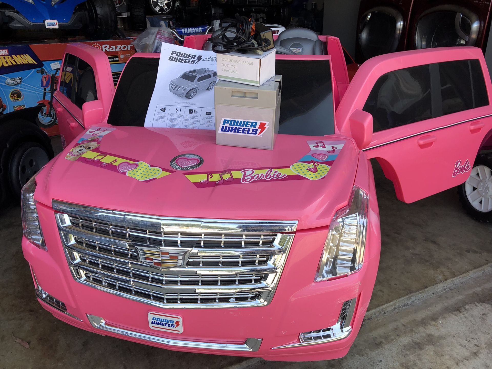 NEW CONDITION Pink Cadillac Escalade 12volt electric kids ride on cars power wheels