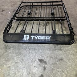 Roof top luggage carrier