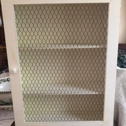 3 shelve cabinet with wire door 18” wide by 24” tall cream color