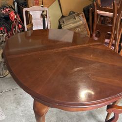 Six Dinning Chairs And Dinning Table With Extensions 