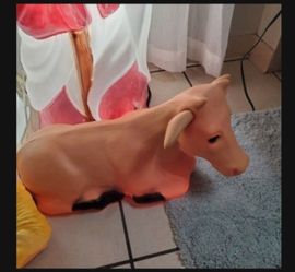Genuine Empire, Nativity Lighted Cow, Includes Light Cord, Color is Orange, Retired Piece, Hard to Find, Condition is Excellent.