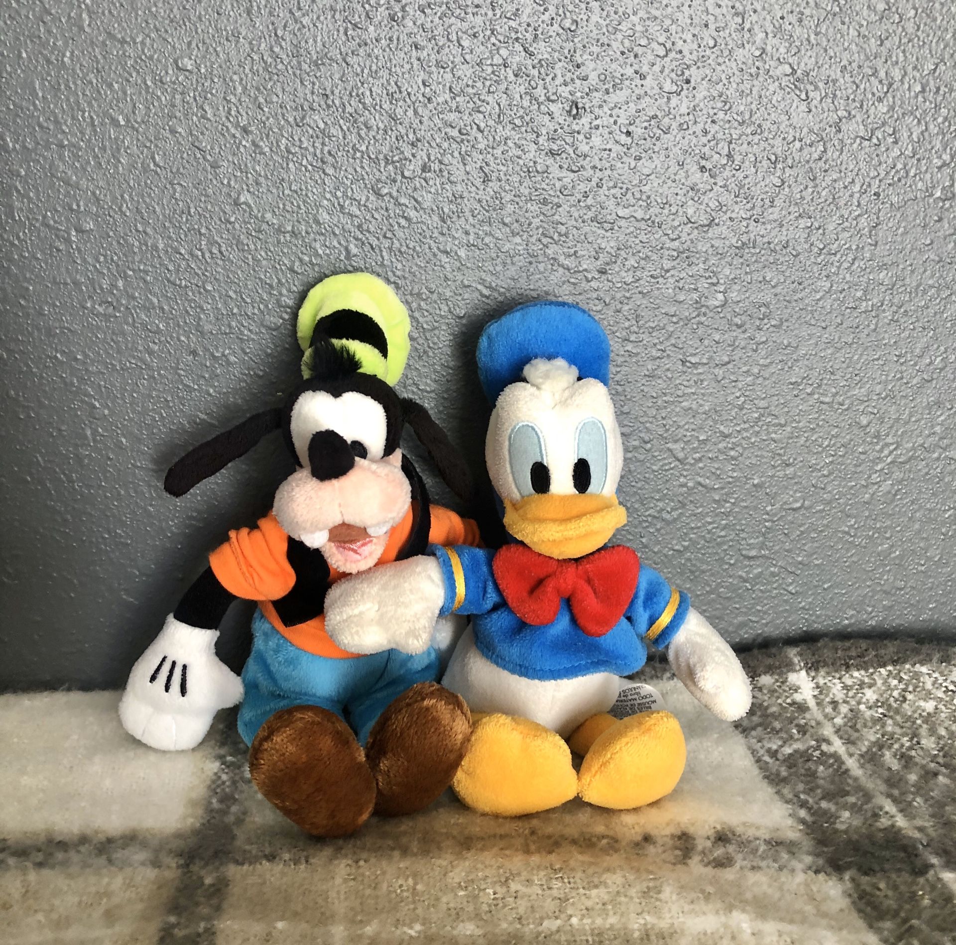 Disney Donald duck and goody stuffed animals