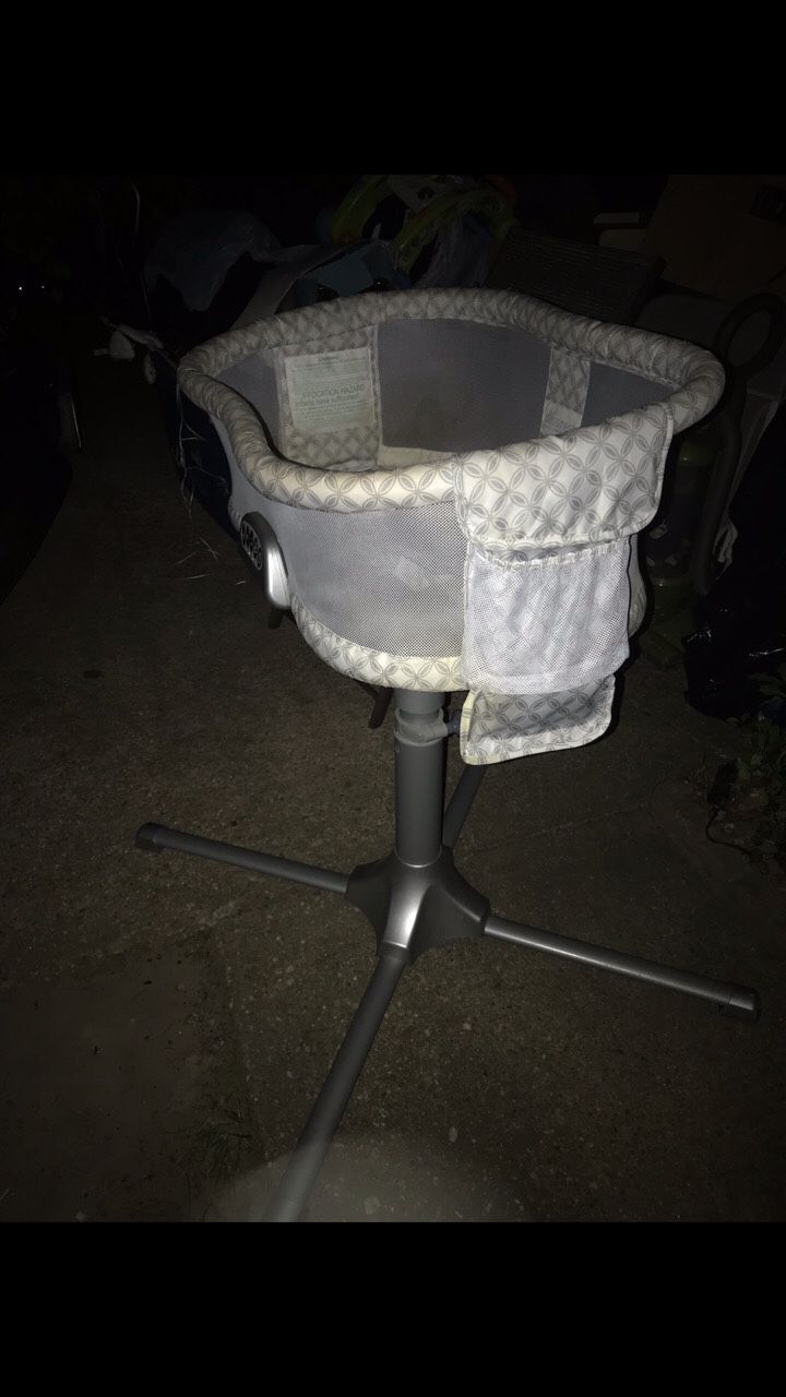 Like New Baby Swivel Bassinet With Music Lights Vibration Mattress Clothing Etc. Everything Goes For $100