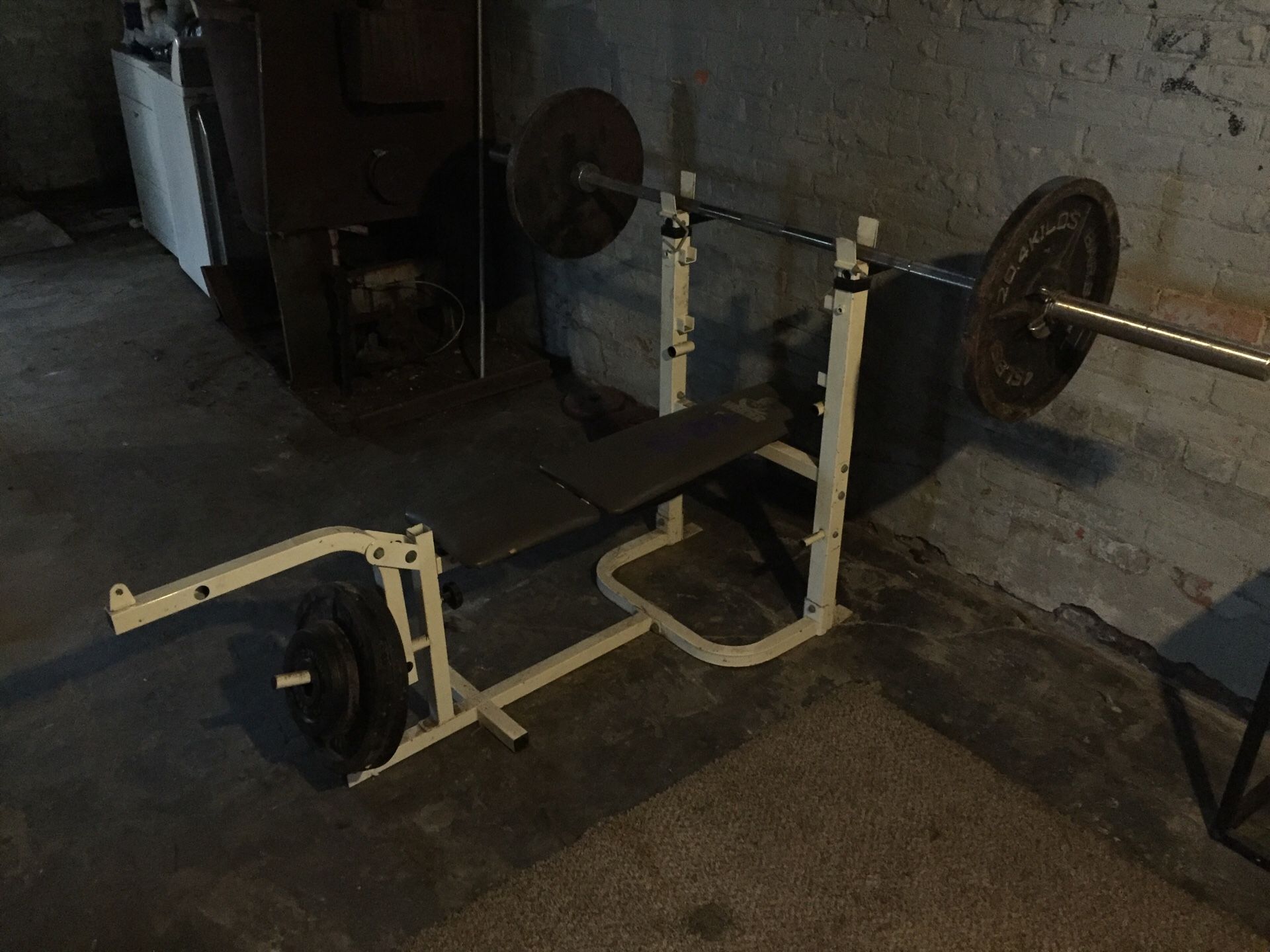 Weight bench with bar and weights