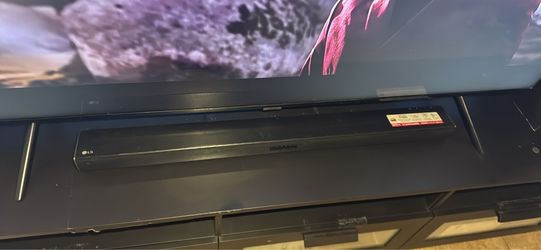TV DE 65 inch+ STAN + speaker de barra con buffer LG