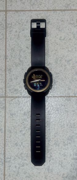 Dark olive NIXON ripley watch.
