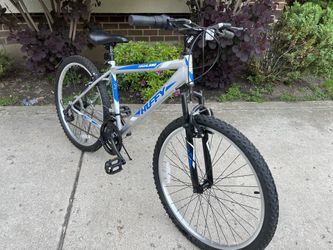 Blue and Silver Highland Huffy Bike