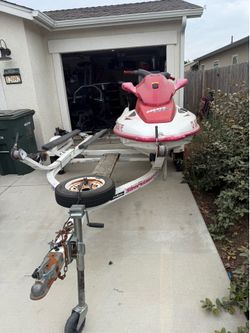 1997 stx 900 jet skii and double trailer