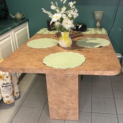 Kitchen table. Measurenents 60x24 Formica table. Beige 