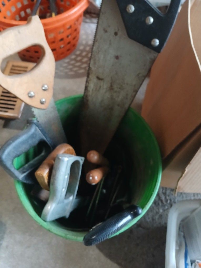 Bucket Of Hand Saws And Related
