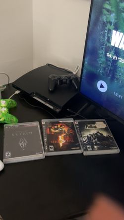 ps3 with games and controllers