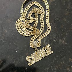 14k Gold And Silver Cuban Chain And Savage Charm 